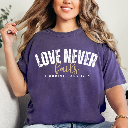 Love Never Fails 1 Corinthians 13:7 Women's Comfort Colors T-Shirt - Eddy and Rita