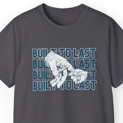 Built to Last Men's Tee: Father's Hand Holding Child's Promise - Eddy and Rita