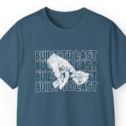 Built to Last Men's Tee: Father's Hand Holding Child's Promise - Eddy and Rita